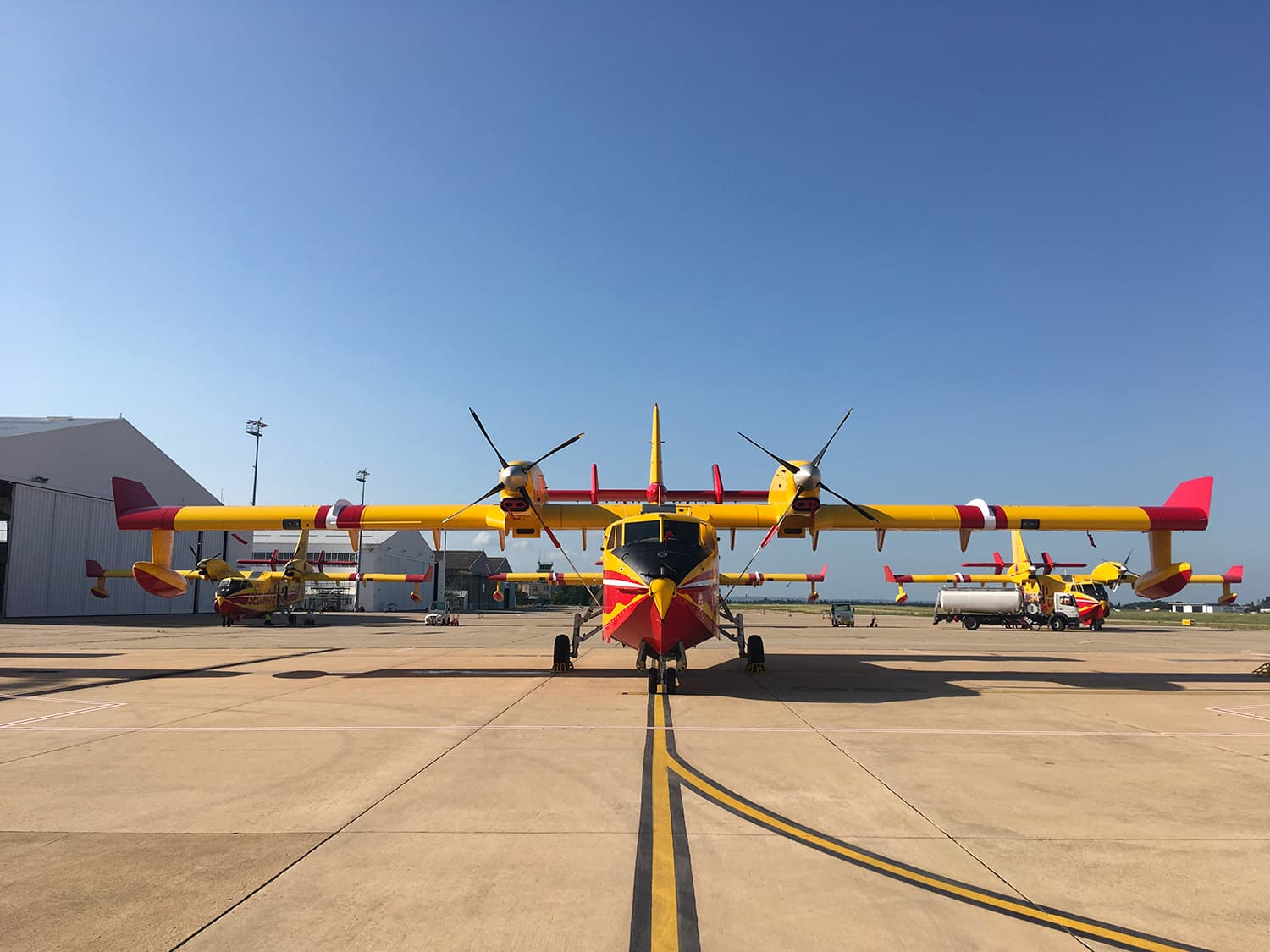 Line of CL-415 Canadair aircraft from the Civil Protection fleet at the Nîmes-Garons base